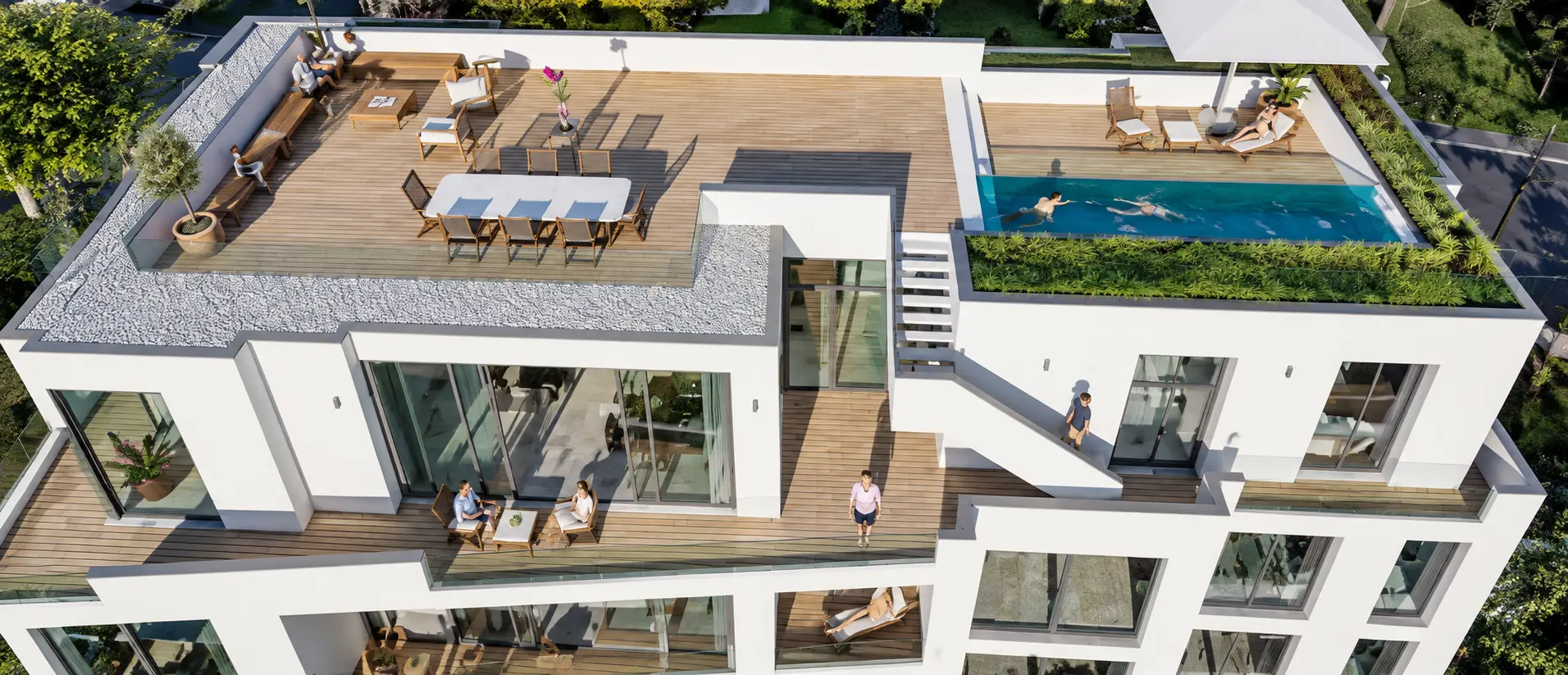 Weiße Villa Heidelberg in der Abenddämmerung: beleuchtete Bestandsvilla mit Turm neben terrassiertem Neubau am Hang