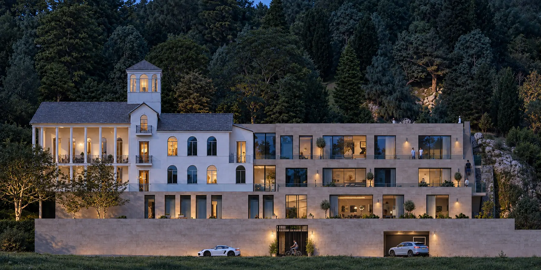 Weiße Villa Heidelberg in der Abenddämmerung: beleuchtete Bestandsvilla mit Turm neben terrassiertem Neubau am Hang