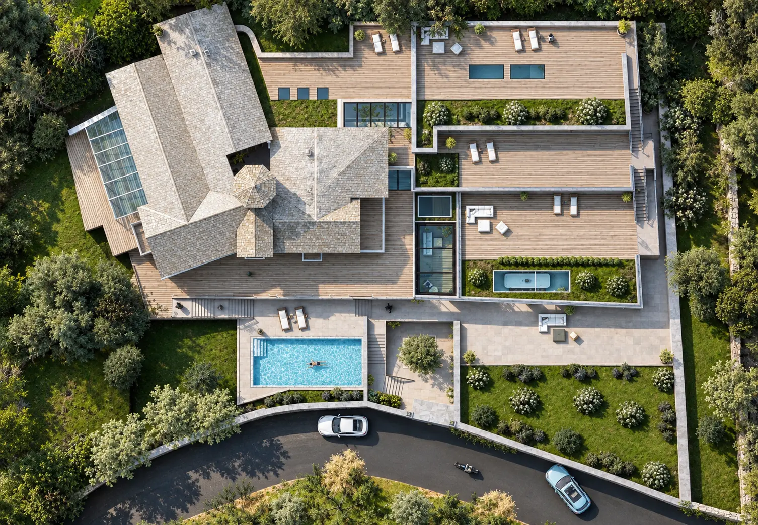 Weiße Villa Heidelberg in der Abenddämmerung: beleuchtete Bestandsvilla mit Turm neben terrassiertem Neubau am Hang